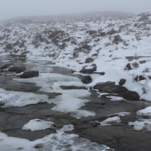 Icy stream heading to the Downfall. Photo © SHT